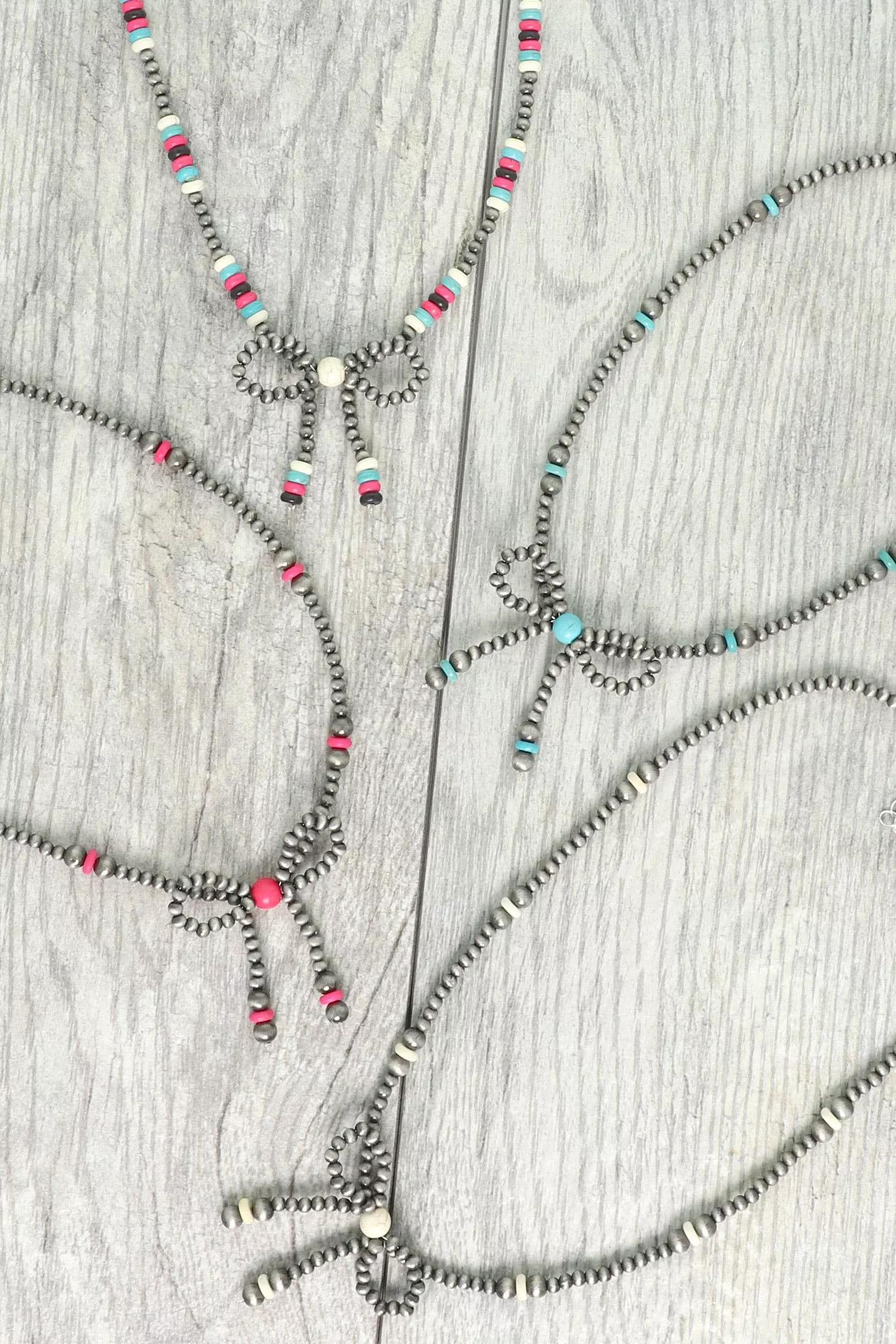 Western Marbled Pearl Bead Long Tail Bow Necklace